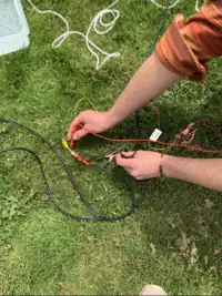 Image 2. Testing the DC Convertor's Output Using a Multimeter.