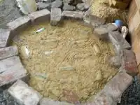 Fig.5 Insulative sub-floor with sawdust slip and recycled bottles