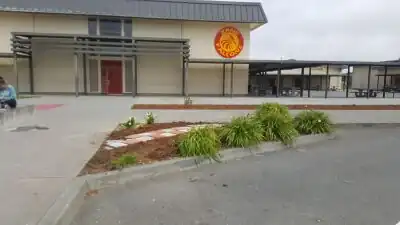 tessellating concrete path Concrete path beautification of the main entrance using a tessellating falcon stamp.