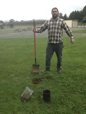 Figure-13: Man collecting soil for soil test.