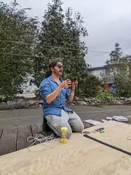 Jordy deliberates over the Newton's Cradle in hand