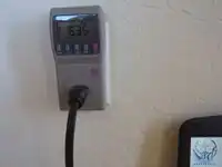 Figure 5. The KillAWatt meter is reading the energy use of the laptop and calculating the yearly cost of running the laptop computer. (Photo by B. Sanders)