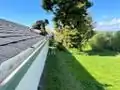 Klara installing gutter screen
