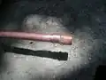 Close-up: threaded end on copper pipe..