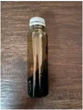 First prototype of ferrofluid, testing how it functions inside a plastic container.