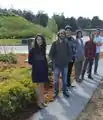The Gardiens on Zane's new permeable concrete path and completed Native Memorial Garden. From front-left to back-right: Tatiana Garcia, Justin Myers, Sam de Vroede, Matt Kuljis, Brandon Boutros, and Cody Hennings.