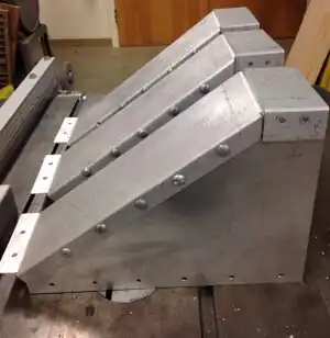 Gutter RepairAn innovative solution for gutter waterfalls in the Zane Middle School quad.